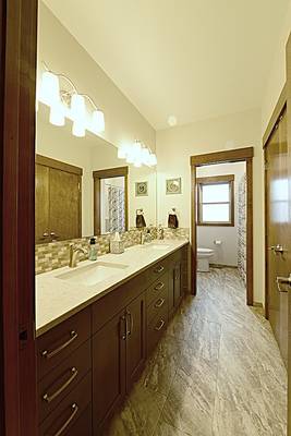 Double vanity Hall bathroom with water closet 