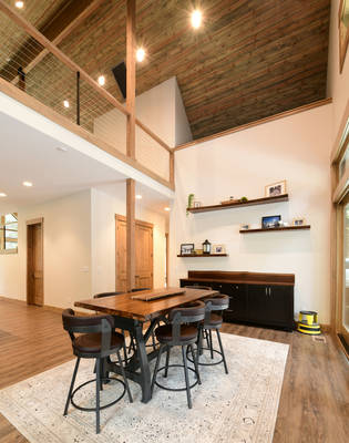 Dining area with Floating shelves and Loft