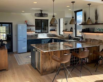 Compact Kitchen with lighting under Floating shelves